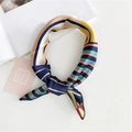 Silk square scarf with geometric blue and orange stripes tied in a stylish bow knot - 2 Geometric