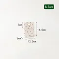Christmas gift bag with Santa and reindeer prints in size S, holiday theme packaging - Colorful Flip Bag-White Small / Size S