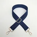 Detail of navy blue nylon strap with adjustable gold buckle and rotating lobster clasps - Blue