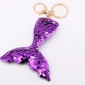 Sparkling purple sequin mermaid tail keychain with gold metal clasp on white background - Mermaid Tail - Purple