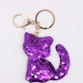 Detail of purple sequin cat keychain featuring shiny reflective scales and golden clasp - Kitten - Purple
