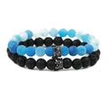 Macro detail of blue cracked stone and black lava beads with micro-paved crown charms - Lava Stone Set Black
