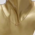Rose gold chain necklace featuring a small letter C pendant on a gold jewelry bust - Initial C / 45+5cm / Rose Gold