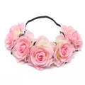 Detailed close-up of pink artificial roses and black elastic band on bridal floral headband - Light Pink