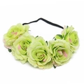 Macro shot of faux green and pink gradient roses on a black elastic bridal headband - Fruit Green