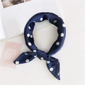 Navy blue silk-like square scarf with white polka dots tied in a decorative neck knot - 13 Polka Dot Navy