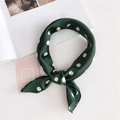 Elegant dark green polka dot silk square scarf styled in a classic French knot - 11 Polka Dot Green