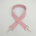 Close-up of pink adjustable nylon bag strap with high-quality gold metal swivel hooks - Gold Buckle / Pink