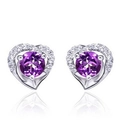 Macro shot of heart-shaped silver earrings with purple gemstones and white crystal borders - Purple Heart Pave (JED283)