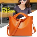 Bolso tote naranja vibrante de cuero con patrón de lichi y correa ajustable - Naranja