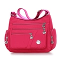 Borsa a tracolla leggera in nylon magenta con multi-scomparti e tracolla regolabile - Rosa Rosso