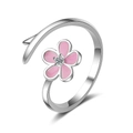 Eleganter verstellbarer Silberring mit pinkfarbener Blume und kleinem Zirkon-Zentrum - Offener Blumenstil / Silber