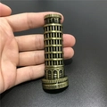 Antique bronze Leaning Tower of Pisa souvenir magnet shown in hand for size context - Leaning Tower of Pisa Italy