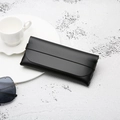 Portable black leather eyewear storage case with a minimalist flap closure design - Plain Pattern / Black