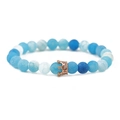 Detail of blue weathered stone beads and rose gold crown charm with inlaid zircons - Rose Gold Weathered Stone