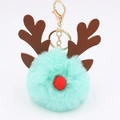 Close-up of mint green reindeer pompom keychain with brown antlers and gold metal clasp - Mint Green