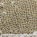Antique gold 4x7mm acrylic flat beads with black embossed Cyrillic letters 100pcs - Antique Gold with Russian Letters