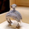 Luxury sparkling round-cut engagement ring with six-prong setting and layered band - US 5 / White