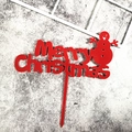 Macro view of red acrylic Merry Christmas cake topper with snowman detail for party decor - Christmas Red Snowman Style