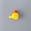 Mini knitted beanie hair clip in bright yellow with a red pom-pom and metal alligator clip - Yellow