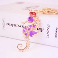 Cute golden seahorse keychain with purple enamel finish and sparkling rhinestones - Purple