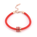 Bracciale intrecciato rosso con anelli in oro rosa e brillanti cristalli rossi - Rosso / Zirconia Rossa
