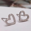 Minimalist S925 sterling silver heart-shaped stud earrings in a polished silver finish - Left-Right Heart