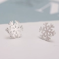 Elegant 925 silver snowflake stud earrings featuring a brushed metallic finish for women - Snowflake