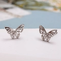 Minimalist silver butterfly stud earrings with elegant hollowed-out metal design - Hollow Butterfly