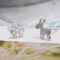 Silver mismatched stud earrings set featuring snowflake and reindeer in brushed finish - Snowflake Deer