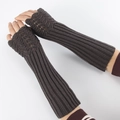 Detail view of dark brown knit fingerless long gloves featuring fish scale stitch pattern - One Size / Dark Gray