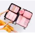 Rosa Reise-Organizer-Set mit atmungsaktiven Netztaschen in einem silbernen Koffer - Rosa