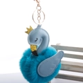 Detail of blue plush flamingo keychain with gold crown and metallic lobster clasp - 8cm Fur Ball Gold Chain Buckle / Lake Blue