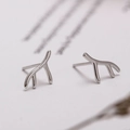 Minimalist silver branch ear studs for women featuring a delicate antler-style design - Antler