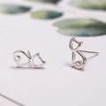 Minimalist silver cat silhouette stud earrings with hollow design for a trendy look - Hollow Left-Right Cat