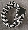 Black and white herringbone infinity scarf with a hidden zipper pocket for smartphones - Wave Pattern White Black