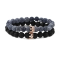 Detail view of 2-piece beaded crown bracelets with matte black and gray cracked stones - Lava Stone Set Rose Gold