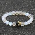 Detail of moonstone beads bracelet featuring a gold crown charm with micro-diamonds - Moonstone Single (NBCB0009)