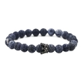 Macro detail of dark blue weathered stone beads and black gold crown charm on bracelet - Gun Black Weathered Stone