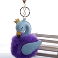 Detail of blue swan plush keychain with purple faux fur ball and golden crown charm - 8cm Fur Ball Gold Chain Buckle / Dark Purple