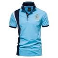 Detailed close-up of sky blue cotton polo shirt with navy striped collar and L size label - Light Blue