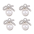 Detailed view of four silver bow pendants with clear rhinestones and large white pearls - Bowknot Round Pearl (px1086-38)