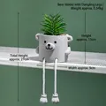 Detail of creative gray cement bear succulent planter with white rope dangling feet decoration - Bear Style