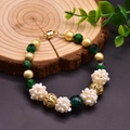 Baroque pearl bracelet with green faceted beads and golden magnetic clasp - Green Tiger Eye Pearl Ball Bracelet
