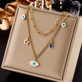 Detail of double-layer gold necklace featuring evil eye, star, and blue drop charms - Star Eye Drop Multi-Pendant Double Style (N1915)