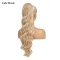Drawstring water wave ponytail extension in light blonde synthetic hair on model - Light Blonde
