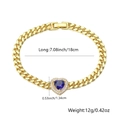 Detail of gold-plated Cuban link bracelet with a micro-pave heart blue stone - Blue