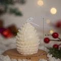 White pine cone scented candle 6.5x5x4.5cm dimension display with cozy bokeh backdrop - Pinecone (White)