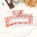 Detail view of transparent rectangular hair claw with red love heart and stripe patterns - 8.5cm Heart Print - Style I Transparent Base