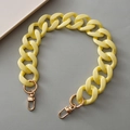 Yellow acrylic link strap for bags with gold metal lobster clasps on neutral background - Light Yellow